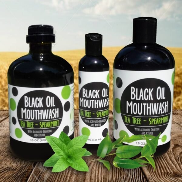 Oil pulling mouthwash with charcoal and xylitol tea tree spearmint flavor